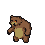 A small, brown bear with a tan belly lunges forward aggressively.