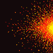 Explosion of yellow, orange, and red pixelated particles dispersing energetically from a bright yellow core against a black background.