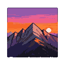 Jagged mountain peaks against a vibrant sunset sky with hues of purple, orange, and pink.