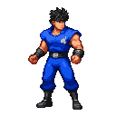 A determined fighter in a vibrant blue outfit, black wristbands, boots, and belt with a white buckle, stands ready with clenched fists and a stern expression.
