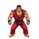 Martial artist in a red gi with a black belt, fists clenched in a defensive stance.