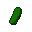 A solitary, deep green pickle with a subtle gradient against a black background.