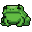 A plump green frog facing forward with legs tucked.
