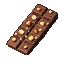 A segmented milk chocolate bar filled with roasted hazelnut chunks.