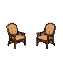 Two ornate wooden armchairs with tan upholstery sit against a black background.