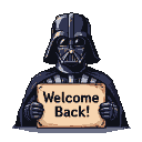 Darth Vader holding a "Welcome Back!" sign.