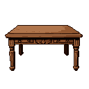 Ornate brown wooden table with carved legs against a black background.