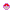 Pink, red, and pale yellow-beige pixelated abstract face with a black background.