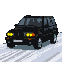 Black 2004 BMW X5 E53 with illuminated yellow "angel eyes" driving on a dark, snowy road.