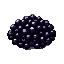 A glistening pile of dark, lustrous caviar with tiny spheres catching the light.