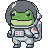 Small green frog astronaut in a silver pixelated helmet and white spacesuit.