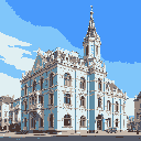 This pixel art showcases a grand, ornate building, possibly a historic government structure, rendered with meticulous detail against a backdrop of stylized clouds. The imposing architecture and cool color palette evoke a sense of quiet grandeur and historical significance.