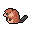 This pixel art image features a cute, retro-style beaver rendered in earthy browns and blacks. The simple design and neutral expression give it a nostalgic charm.