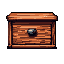 This pixel art showcases a detailed wooden drawer, rendered in warm browns and oranges with careful attention to wood grain and subtle highlights. The solitary drawer evokes a sense of quiet utility, reminiscent of classic RPG game assets.