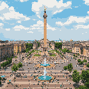 This pixel art depicts a bustling city square from a high vantage point, dominated by a tall, sandy monument topped with a golden figure. The square teems with tiny pixelated people gathered around a fountain, creating a vibrant and lively urban scene.
