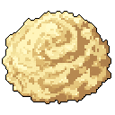 A textured mound of creamy, light yellow and brown substance dominates the frame, its swirling patterns suggesting a viscous quality. The isolated subject is presented against a stark black background, drawing full attention to its soft, lumpy form.