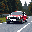 A sleek, black hatchback racing car with red and white details speeds along a paved road, captured in dynamic pixel art. The low-poly style evokes a sense of retro racing excitement.