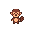 This pixel art image features a cute, retro-style monkey character rendered in earthy browns and tans. Standing against a black void, the cheerful primate evokes nostalgic vibes of classic 8-bit video game sprites.