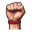 This pixel art image showcases a clenched fist with a red studded wristband, conveying strength and defiance. The detailed shading and realistic skin tones highlight the muscle definition and power of the hand. The stark black background emphasizes the fist's central role as a symbol of determination.