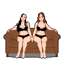 Two pixel art figures, dressed in matching bralettes and briefs, sit comfortably on a sofa, their hands intertwined, against a stark black background. The intimate scene conveys a sense of closeness and relaxation between the two women.