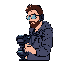 A pixel art image depicts a bearded man with aviator sunglasses and headphones, holding a professional camera. His focused gaze and gear suggest a dedicated photographer in action.