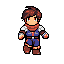 A pixelated young adventurer in vibrant blue and red attire stands ready for action, his brown hair highlighted with red, against a stark black background, evoking classic RPG nostalgia.